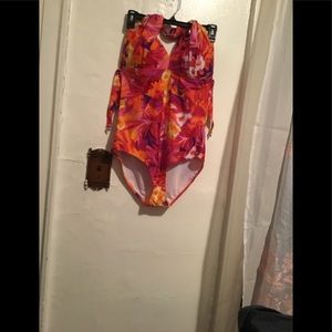 Size 1XL One piece open back swim suit very sexy.